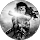 M B